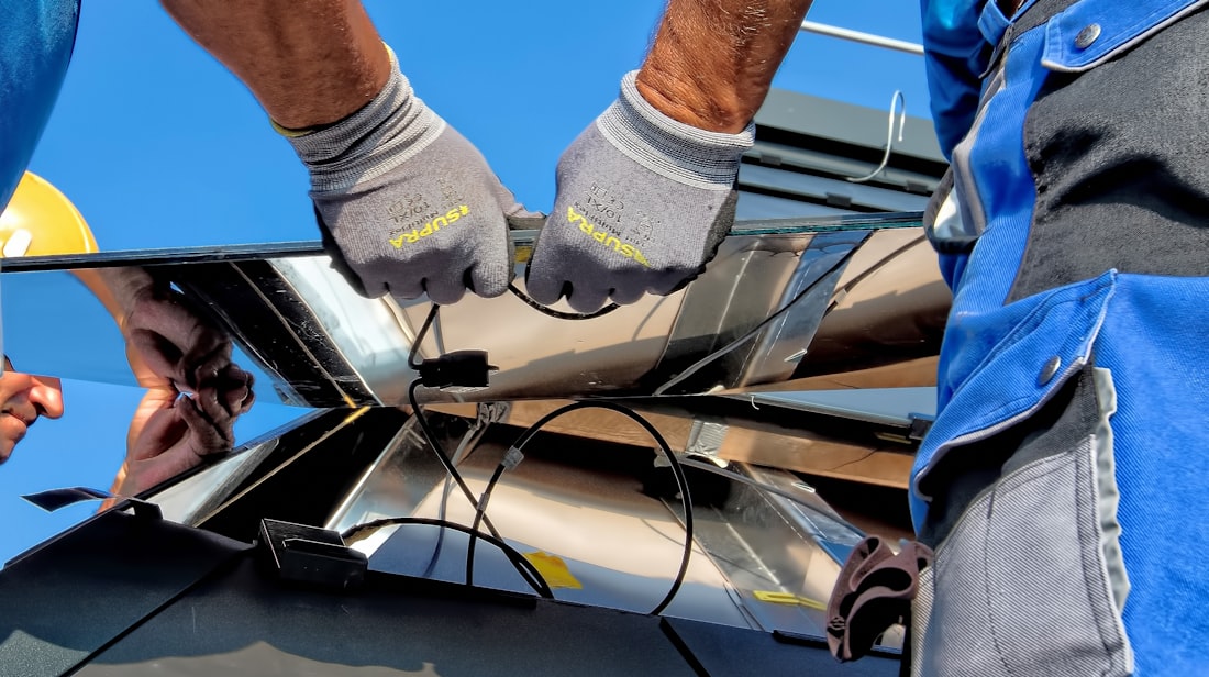 MSEnergy technician installing solar panels in Islamabad